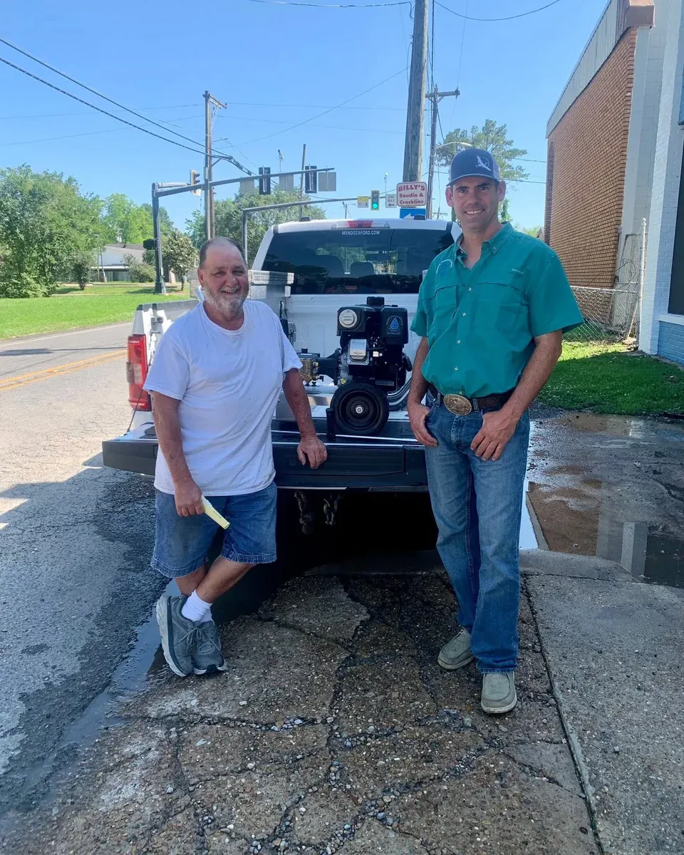A customer with their machine at Cleaning Chemical Solutions